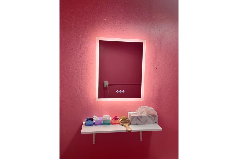 Pink mirror interior detail at La Para Nail Lounge